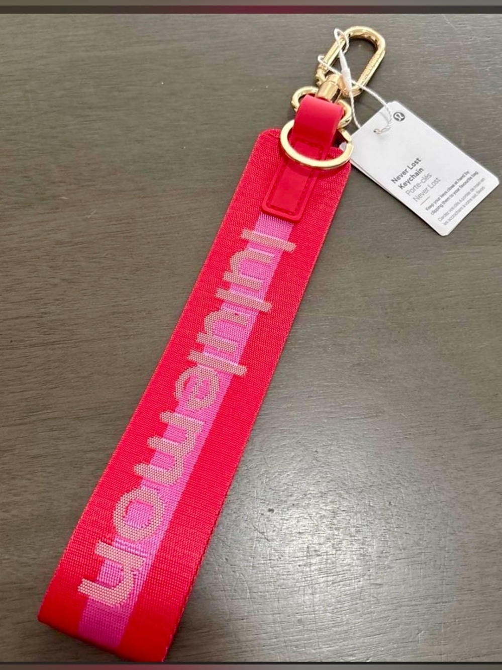 Lululemon Never Lost Keychain Pink Wristlet with Gold Hardware
